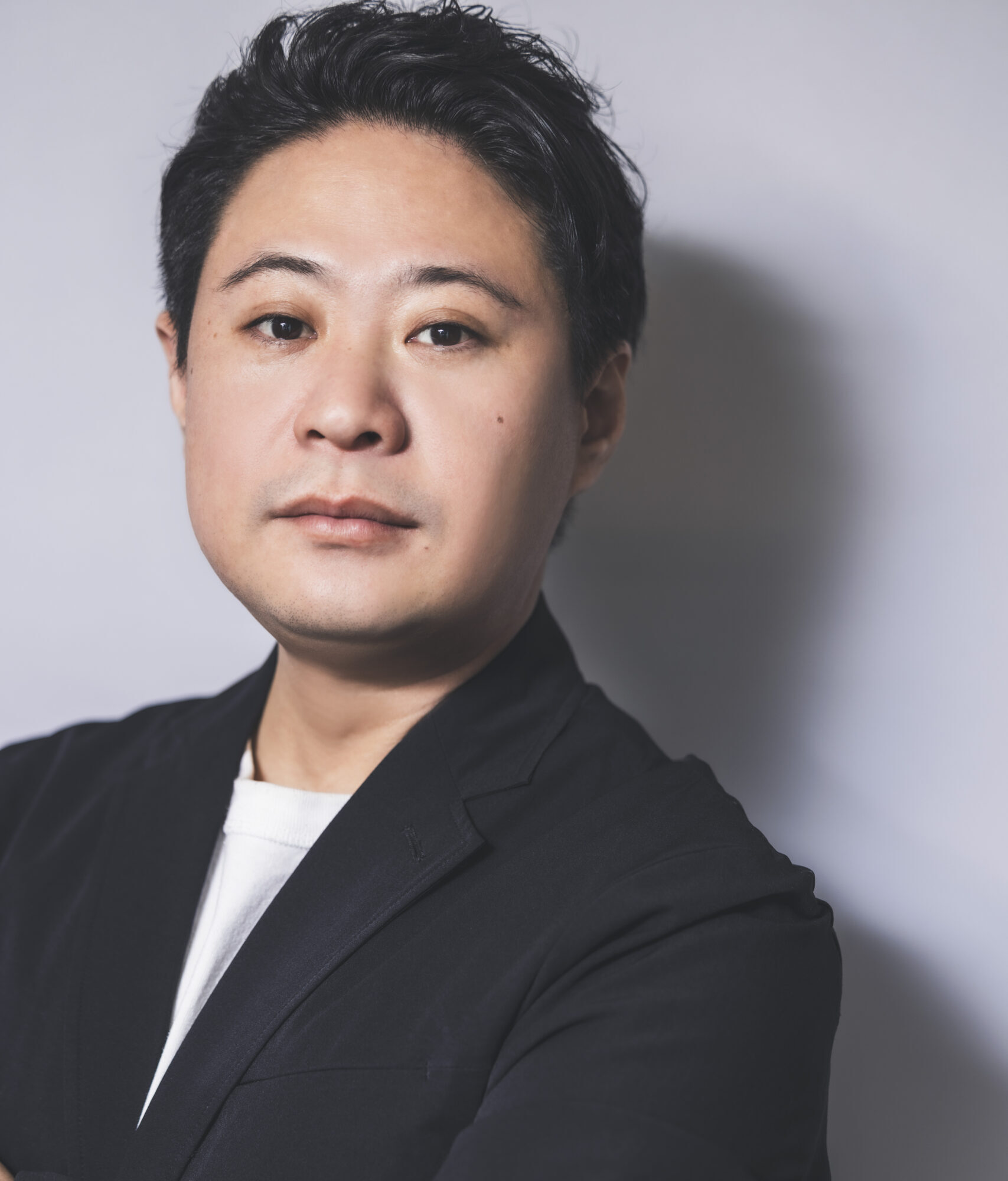 稲益仁